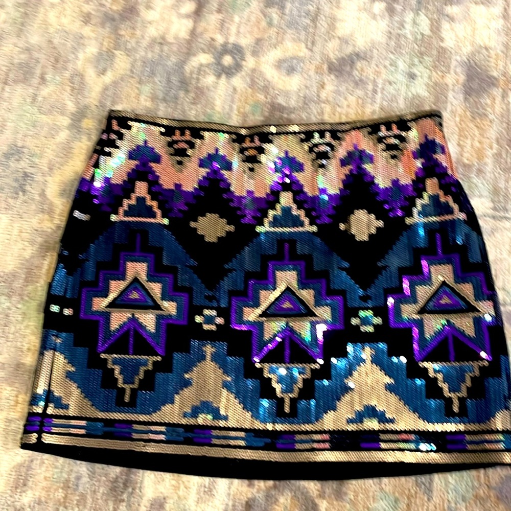 Sequin mini skirt.